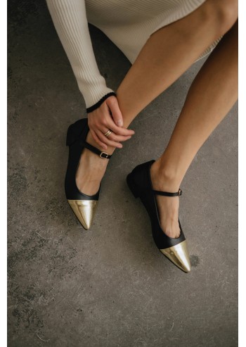 Black and gold pointed Mary...